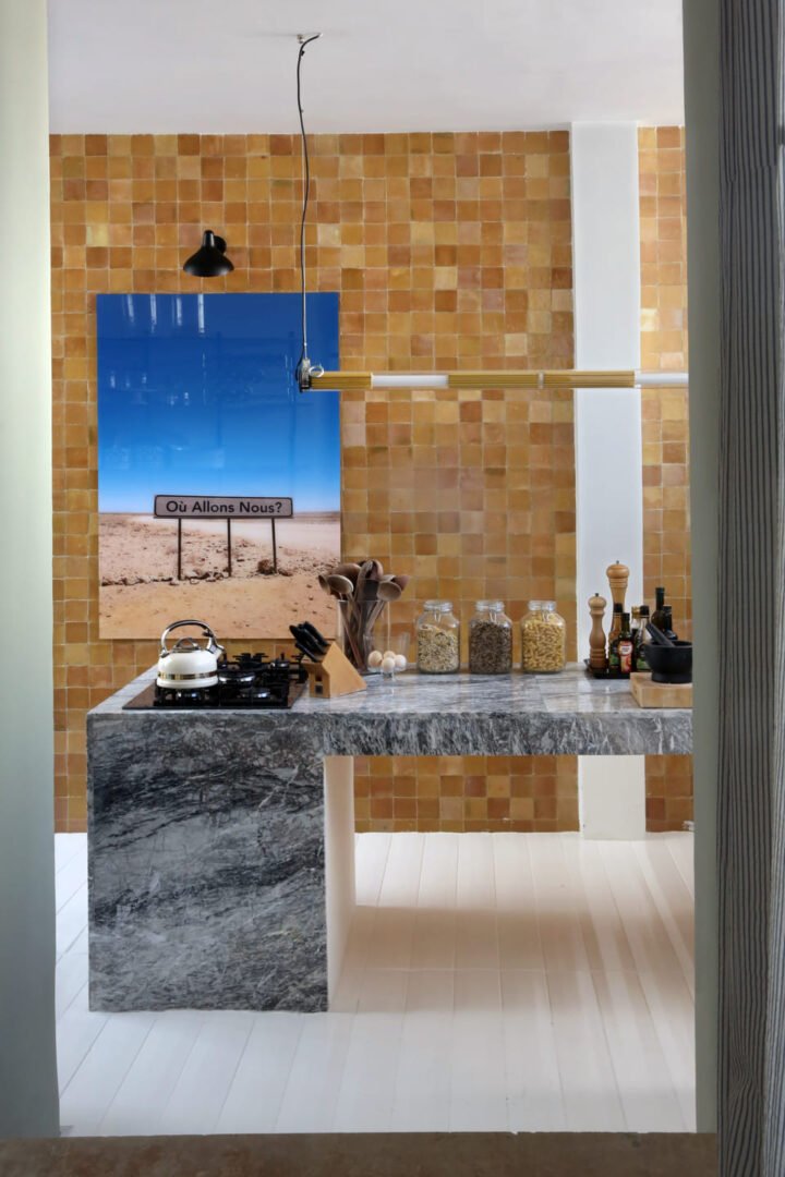 Ochre Moroccan tiles in the kitchen of Villa Augustine Tangier