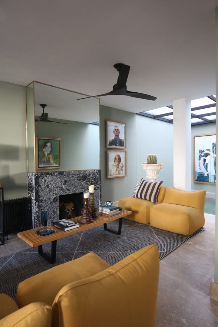 Living room with yellow sofas in villa Augustine Tangier